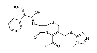 7β-[[[(Z)-Hydroxyimino]phenylacetyl]amino]-3-[[(1-methyl-1H-tetrazol-5-yl)thio]methyl]cepham-3-ene-4-carboxylic acid Structure