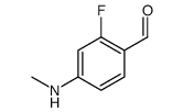 Benzaldehyde, 2-fluoro-4-(methylamino)- (9CI) Structure