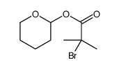 oxan-2-yl 2-bromo-2-methylpropanoate Structure