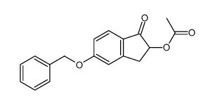 5-(benzyloxy)-2,3-dihydro-1-oxo-1H-inden-2-yl acetate结构式